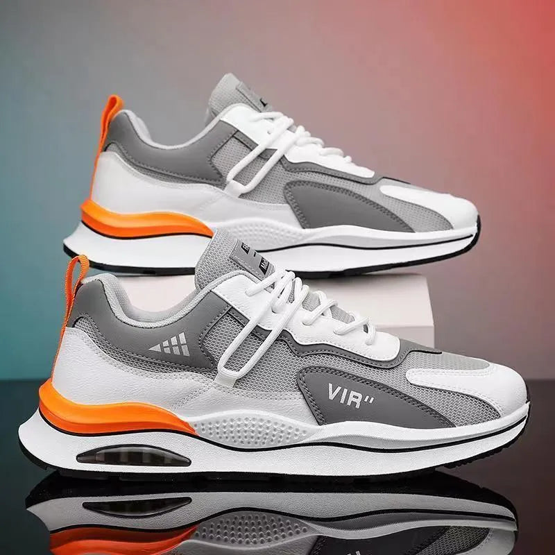 Men's grey breathable mesh casual shoes with a round toe and middle-top height on a white background.