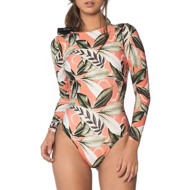 Women's leaf print floral backless one-piece swimsuit on a mannequin.