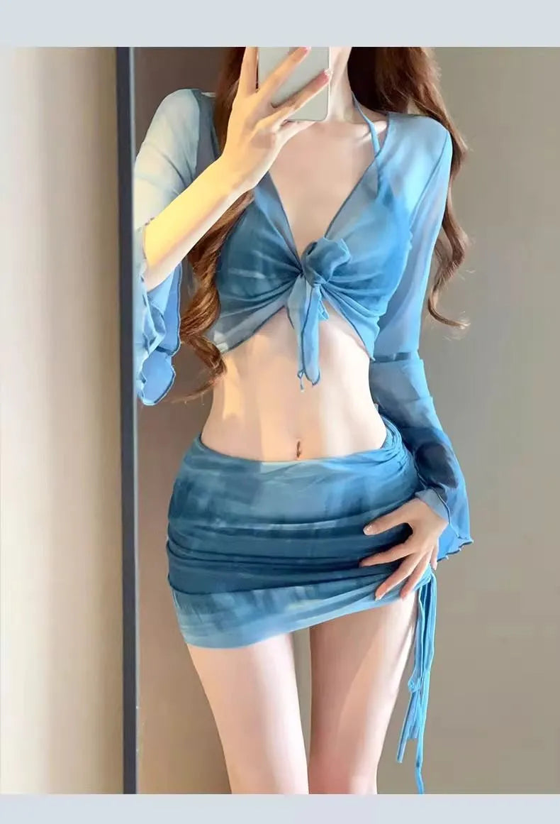 Women's blue high waist bikini four-piece swimsuit set with shirt, bra, underwear and skirt components