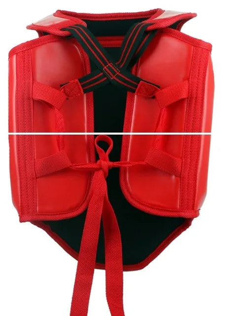 Red boxing helmet and matching one-piece chest protector on a sports background.