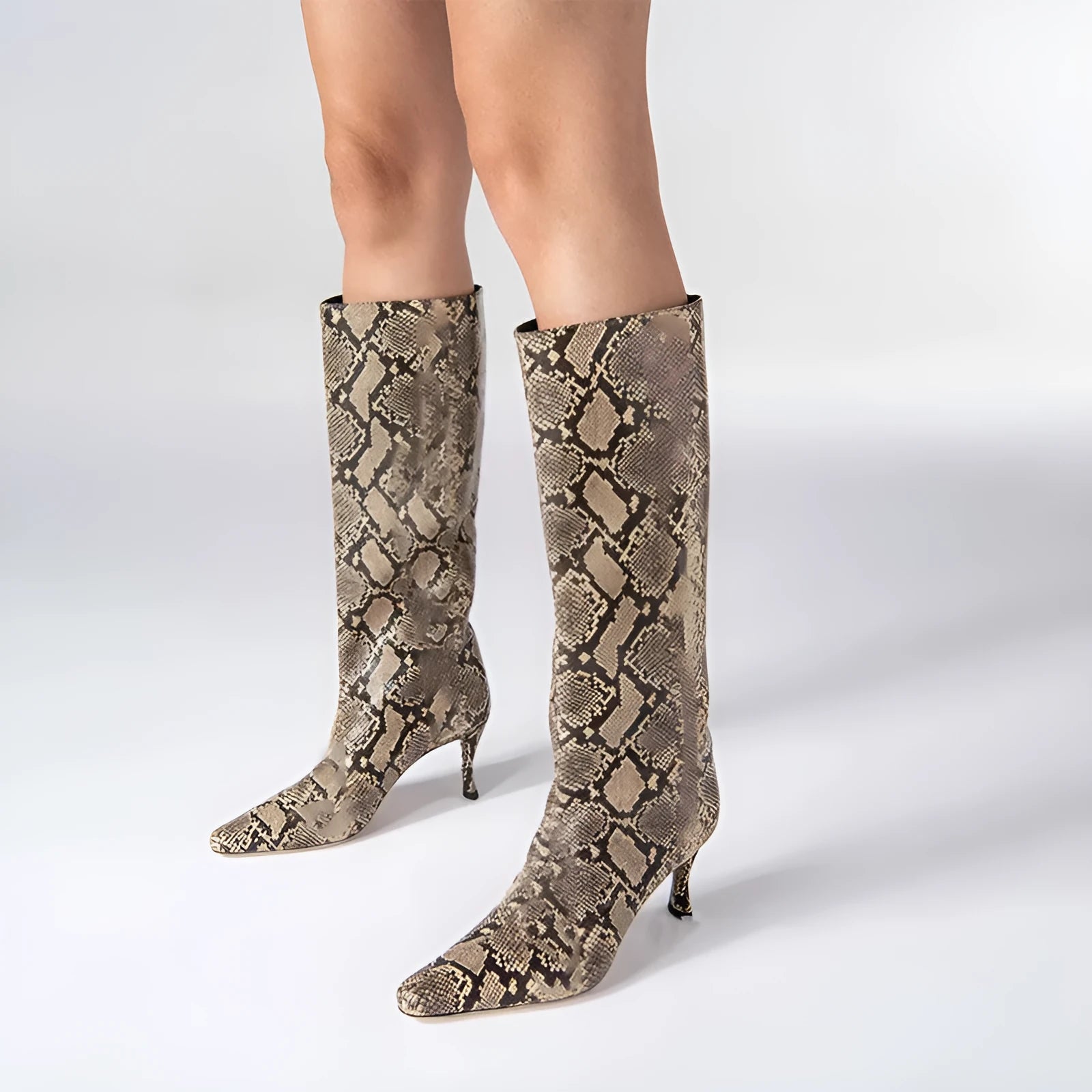 Women's square toe cowboy boots in microfiber, shown in a choice of colours including black, brown, and snake print.