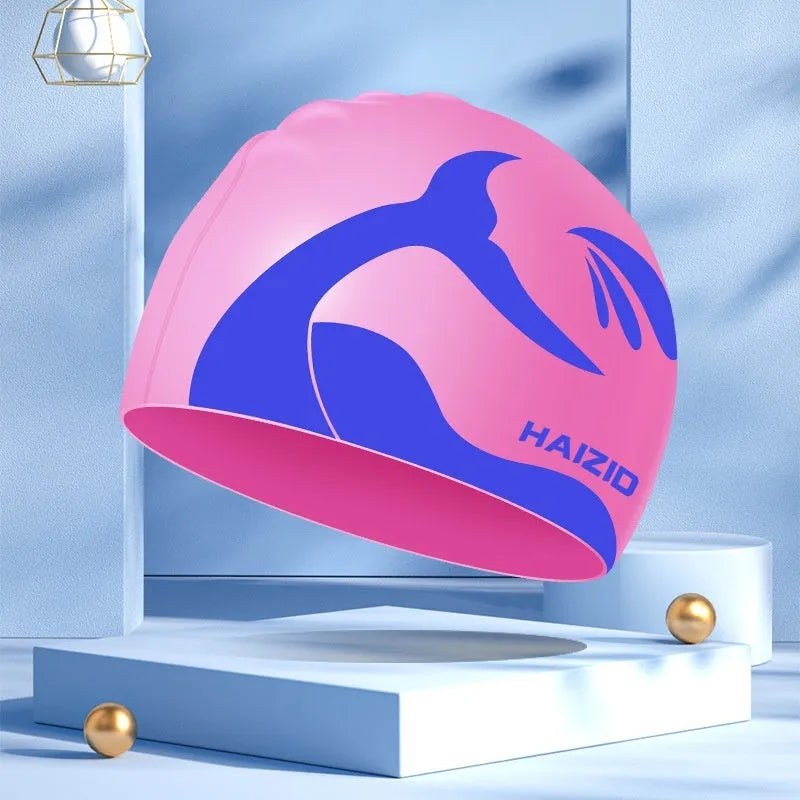 Silicone swim cap with whale tail pattern and waterproof ear protectors in multiple colour options