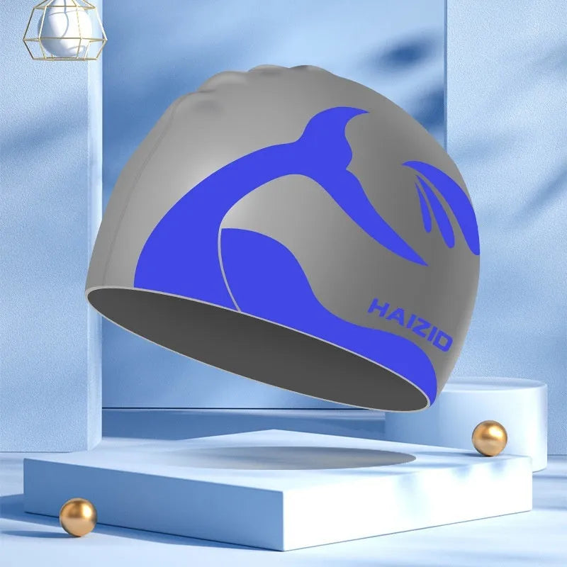 Silicone swim cap with whale tail pattern and waterproof ear protectors in multiple colour options