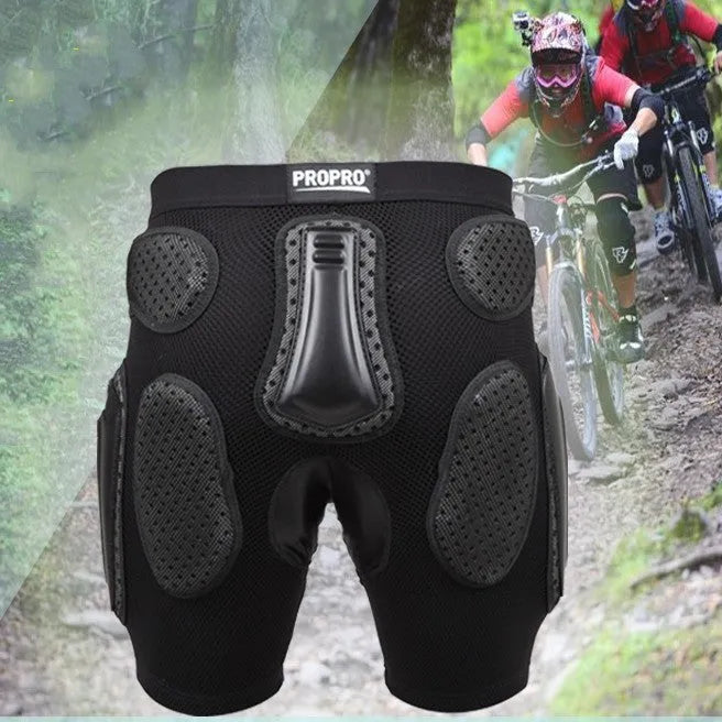 Black cycling trousers with integrated protective hip padding, shown in size L.