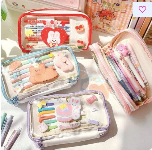 Transparent TPU pencil case with Korean-style pink rabbit design showing visible pens inside
