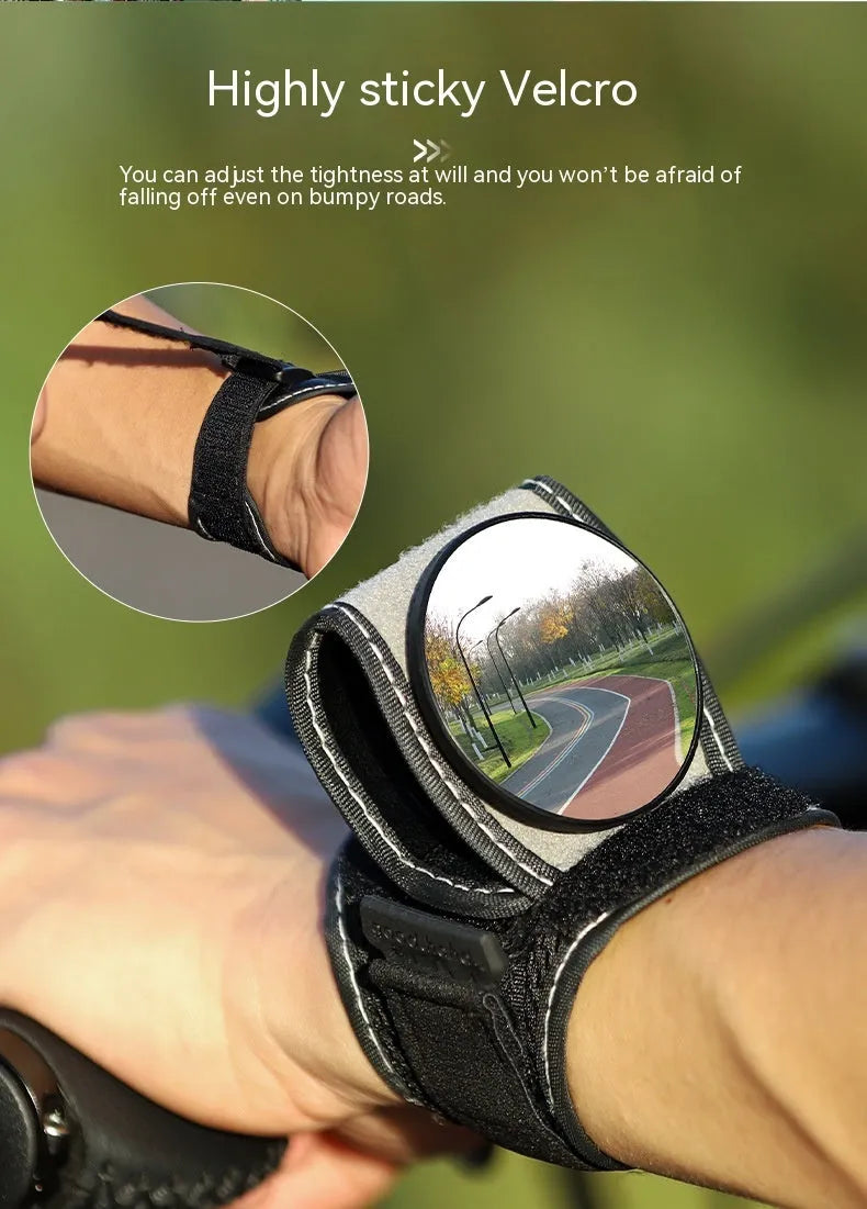 Black wrist-mounted bicycle rear-view mirror with adjustable arm for cycling safety
