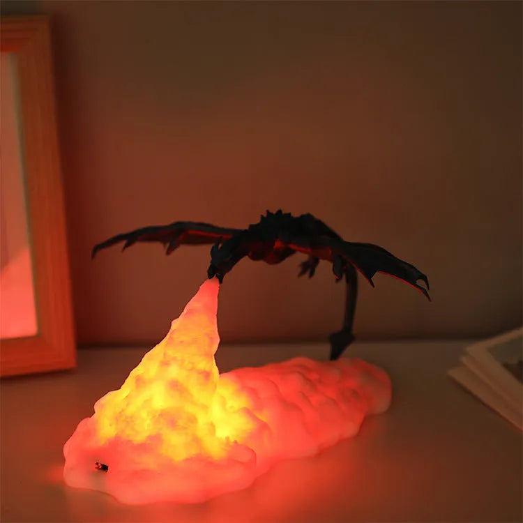 3D printed dragon lamp glowing with warm red light, showing detailed fire dragon design on a table.