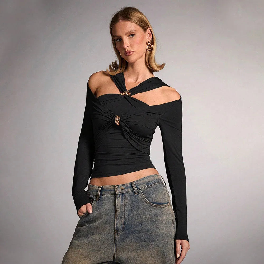 Black women's slim fit halter neck cropped top on a model, showing the sleeveless shoulder-baring design.