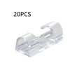 Transparent plastic self-adhesive cable routing clips in four sizes for wire organisation