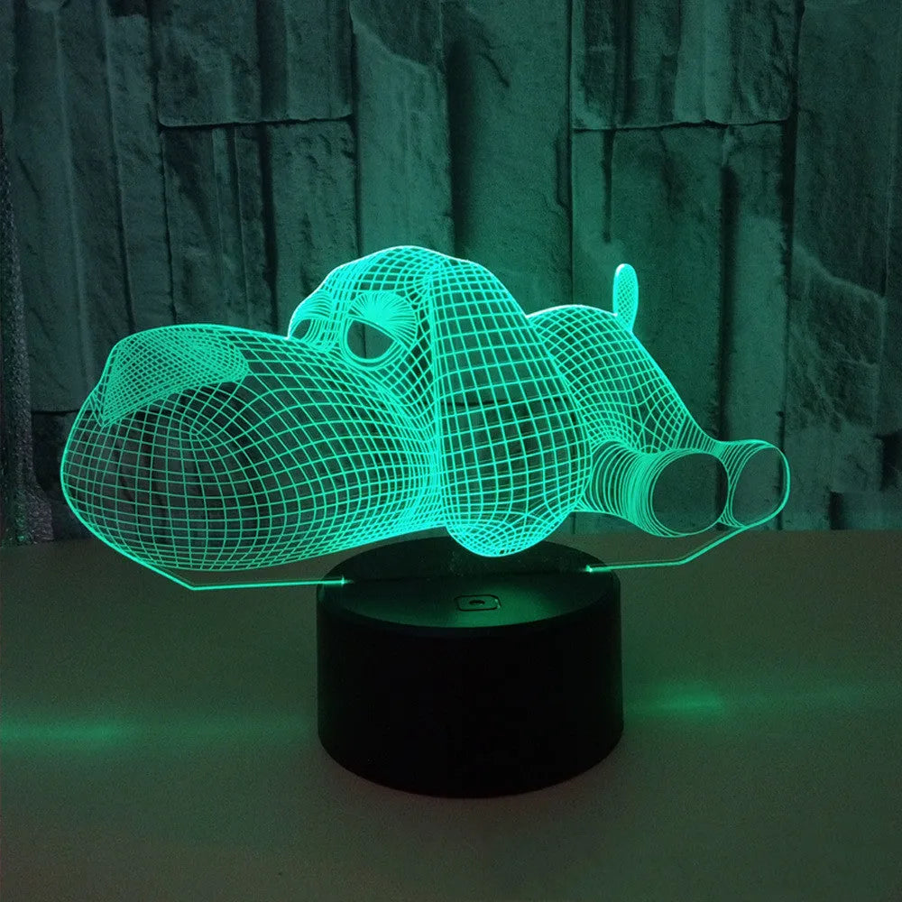 Doggo Desktop Lamp showing 3D dog illusion glowing in blue light on a desk