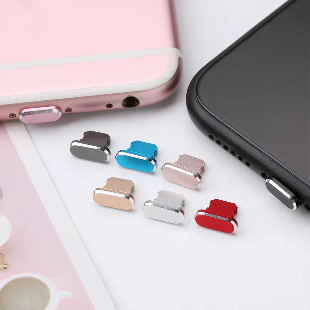 Aluminium alloy dust plug for iPhone charging port in various colours including gold, silver and rose gold.