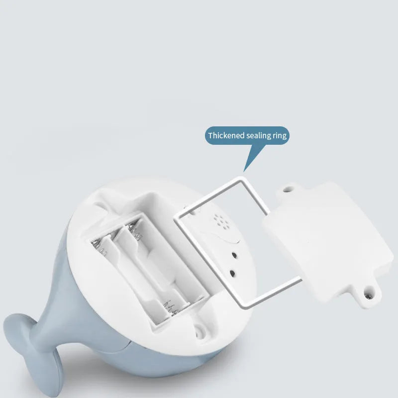 Electric induction whale bath toy with water spray and LED lights for baby bath time