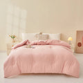 Soybean fibre pure cotton quilt shown in grey, pink jade or white colour on a bed.
