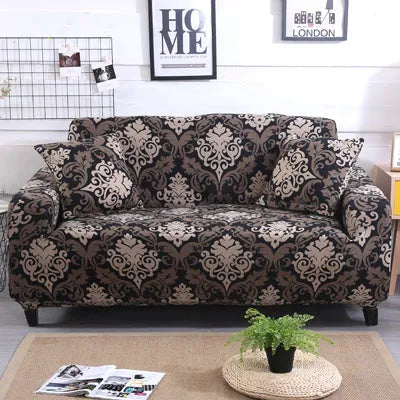 Geometric print stretch sofa slipcover fitted on a grey three-seater sofa.