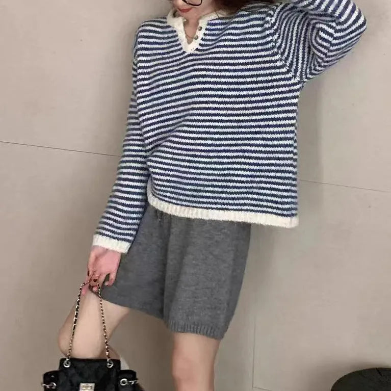 Red and blue striped cashmere pullover sweater for women with plaid pattern and loose fit.