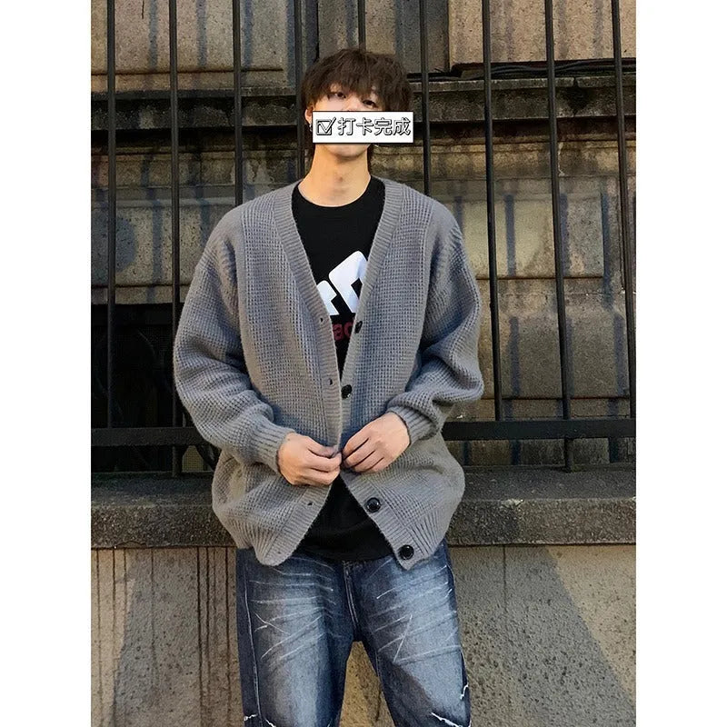 Men's loose-fit cotton blend cardigan sweater with V-neck collar and long sleeves in solid colour