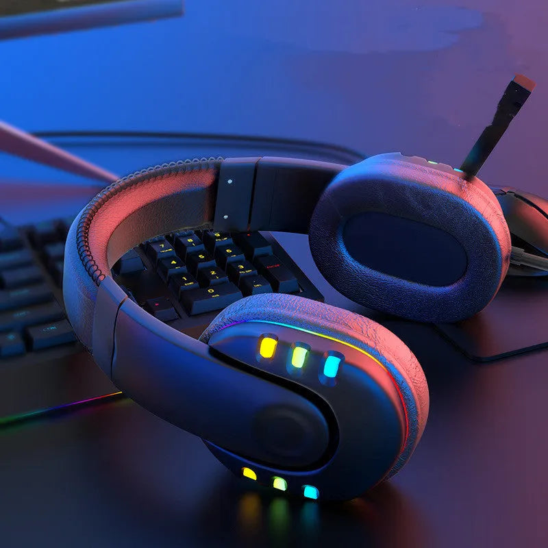 Gaming headset with LED breathing light, 40mm drivers, and omnidirectional microphone on a black surface