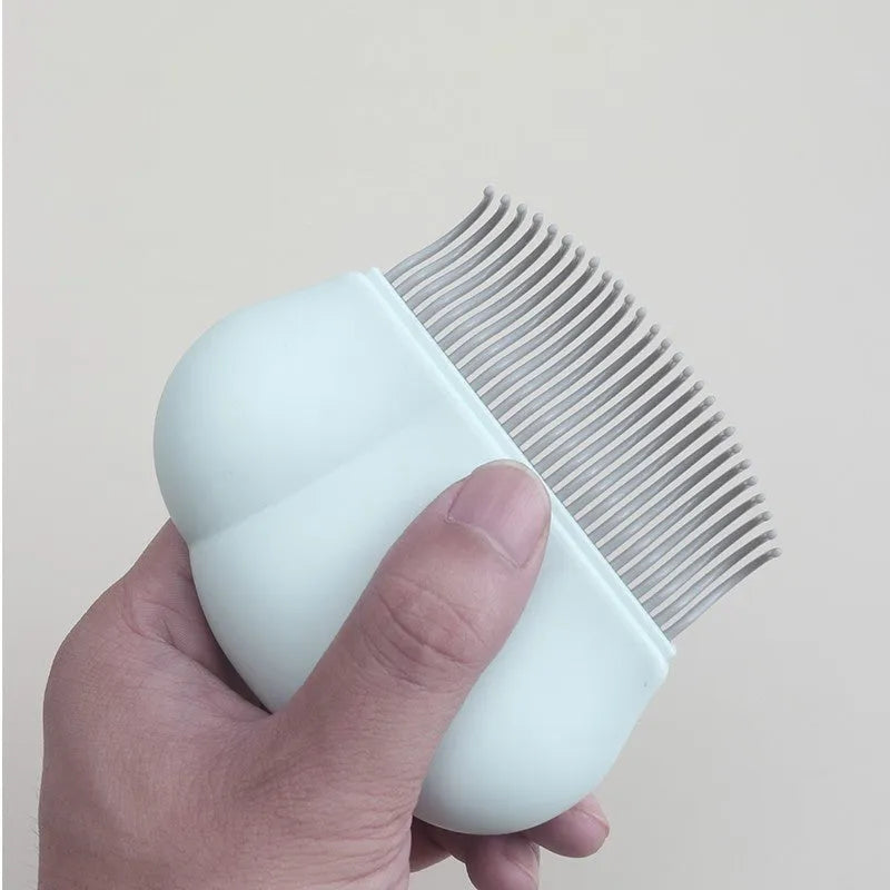 Paw Soft Deshedding Brush for pets in blue, pink, or white, measuring 9cm by 9cm.