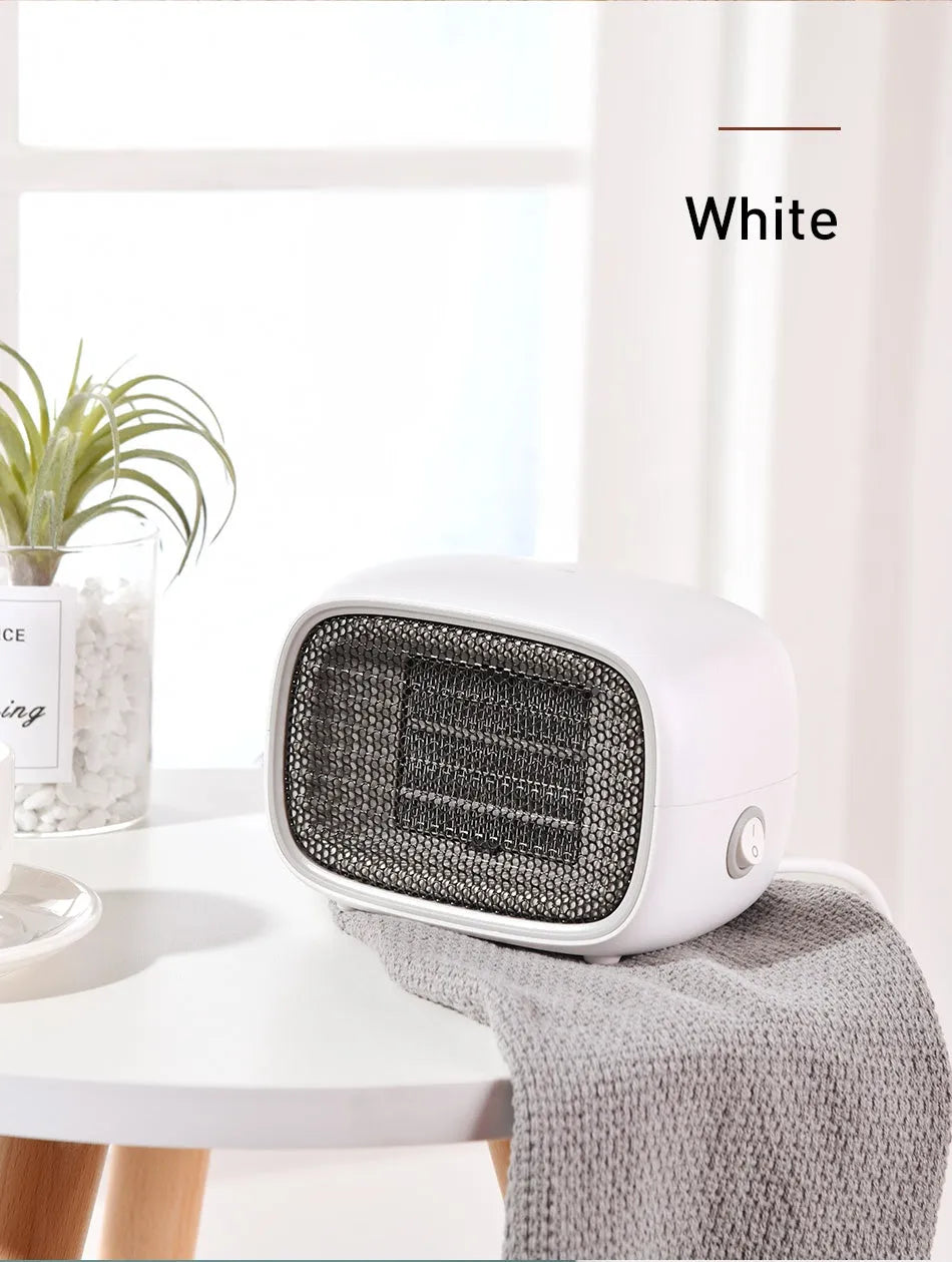 Mini ceramic heater in green, white, or yellow colours showing compact design with dimensions