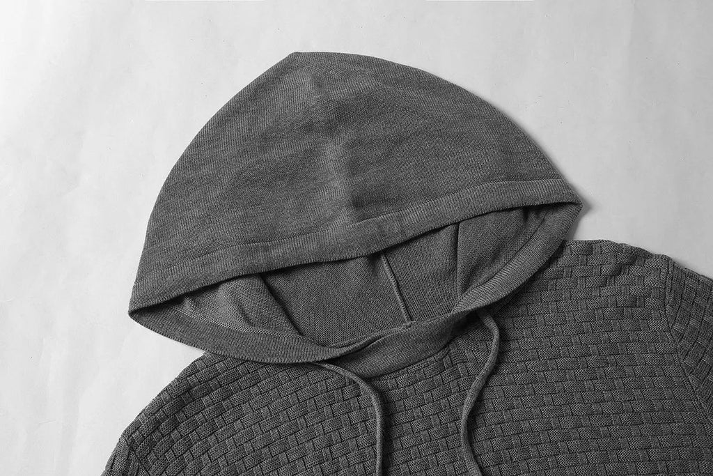 Men's grey cotton-polyester blend hoodie sweatshirt on a hanger.
