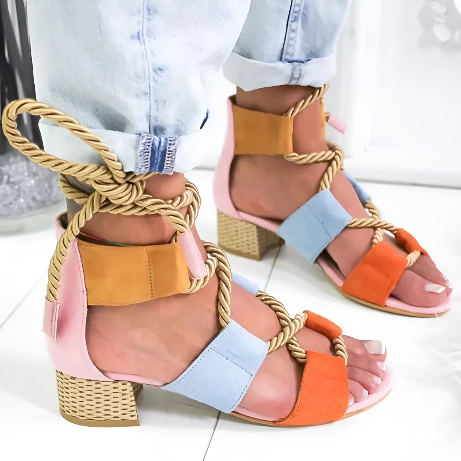 Women's beige suede sandals with thick matching heels and front strap design