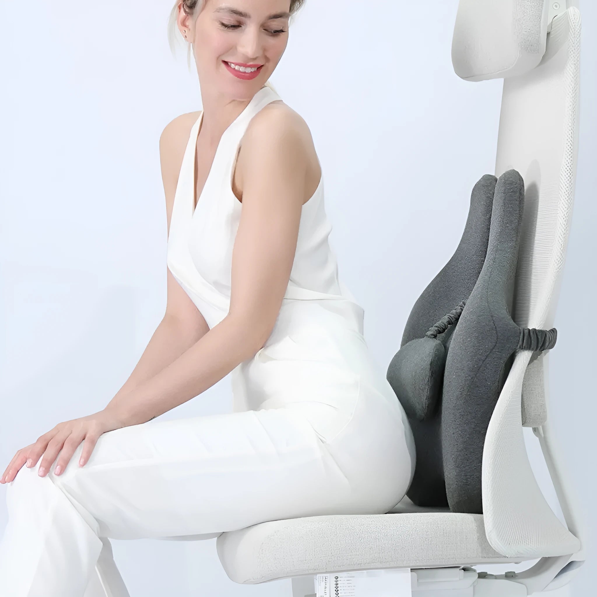 Adjustable memory foam car cushion for lumbar support in black colour on car seat