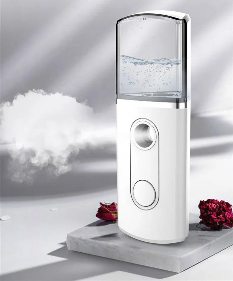 Portable facial nano mist humidifier in white with 20ml tank and compact 10cm body