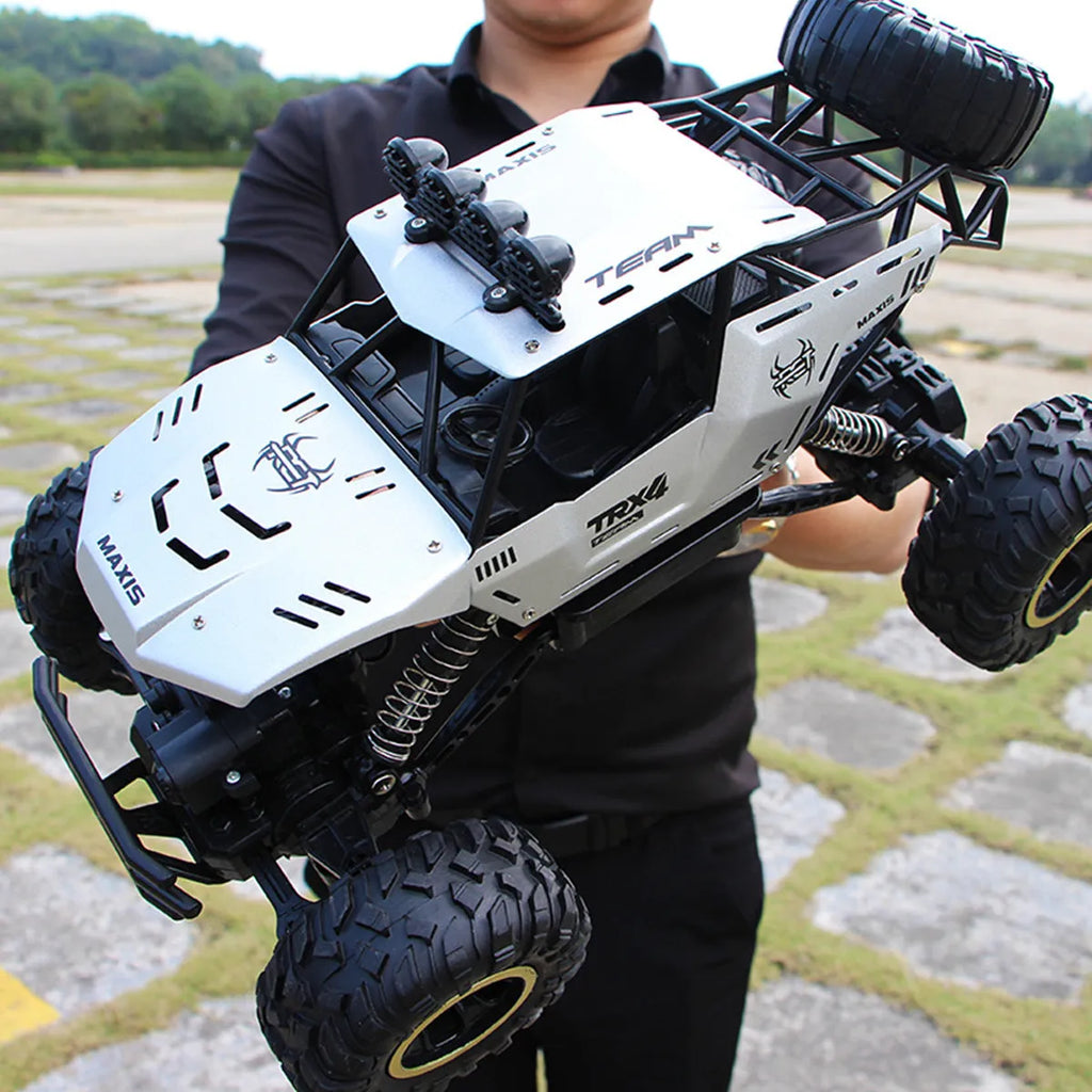Large black 4WD remote control climbing car with 2.4G wireless controller