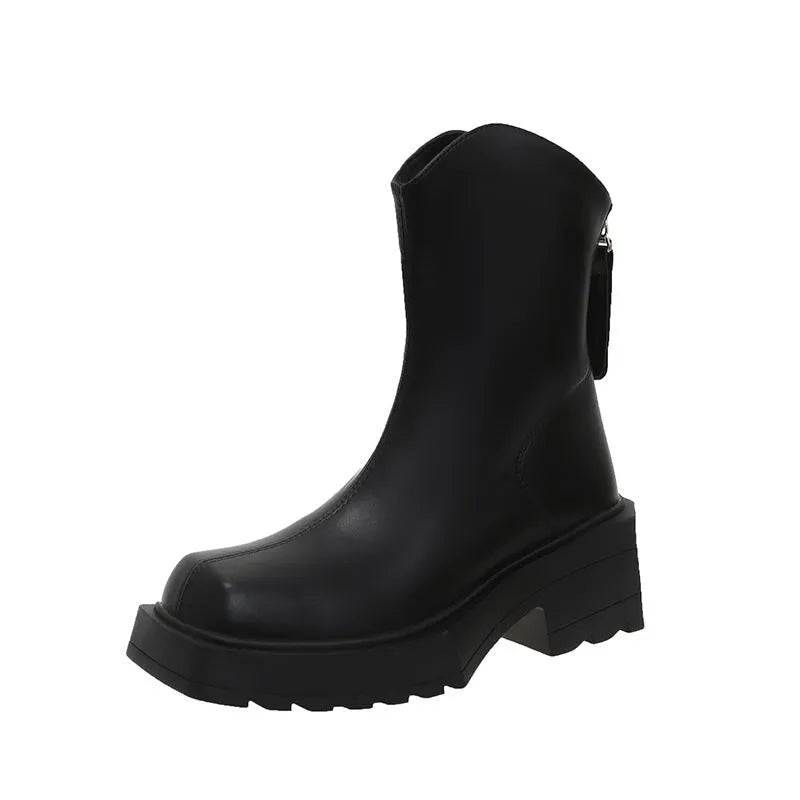 Black platform Martin boots for women with square toe and back zipper on a mid-calf.