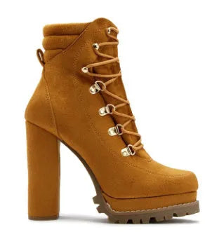 Women's suede high heel boots with round toe, thick heel, and Roman-style rivet and buckle details