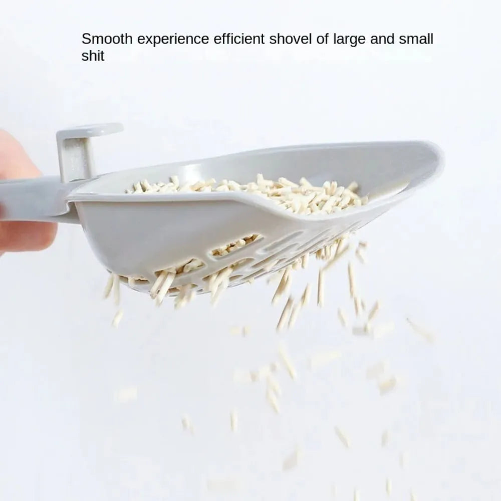 Grey plastic cat litter scoop with matching base tray for self-cleaning litter boxes