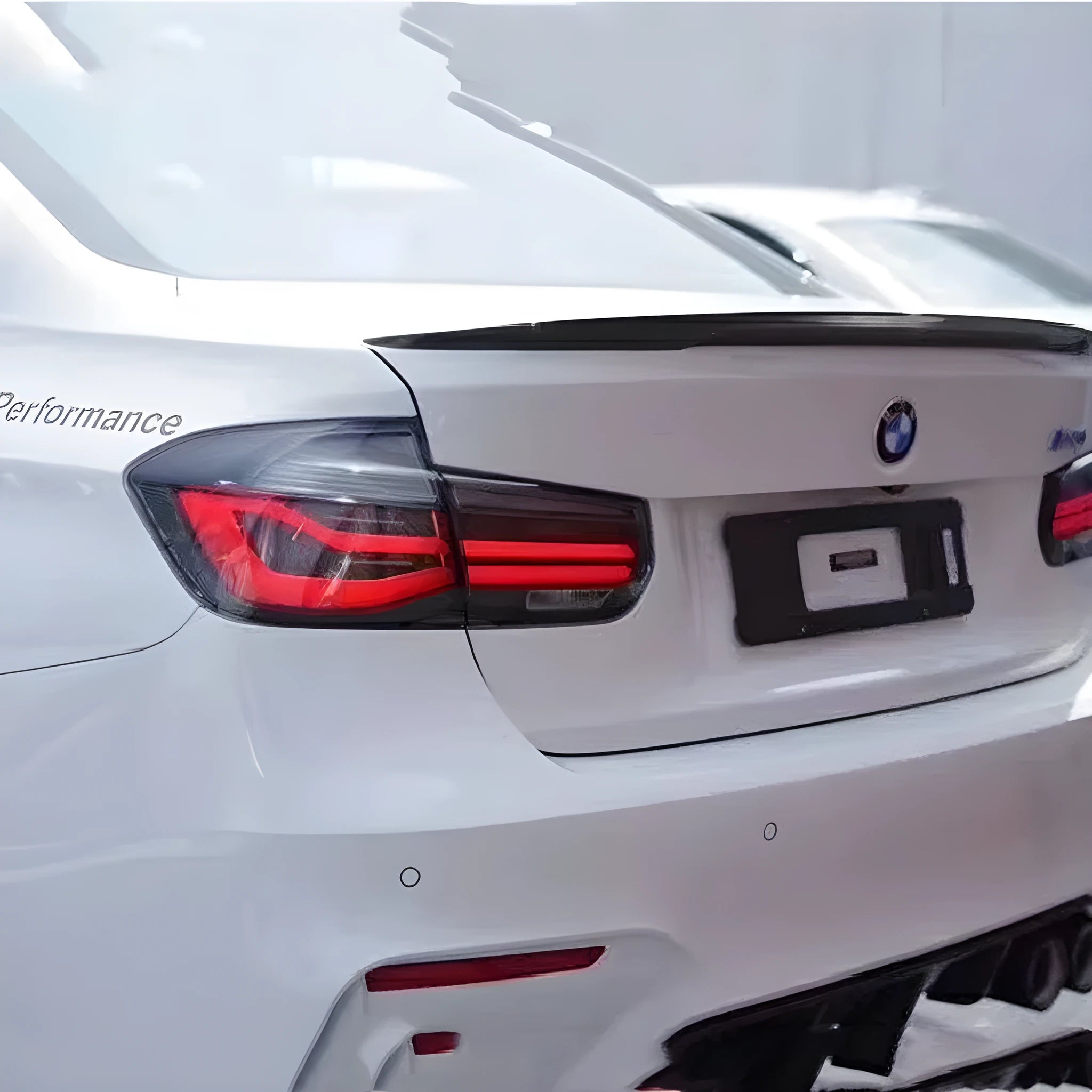 BMW 3 Series modified LED tail light assembly in red or smoked black finish.