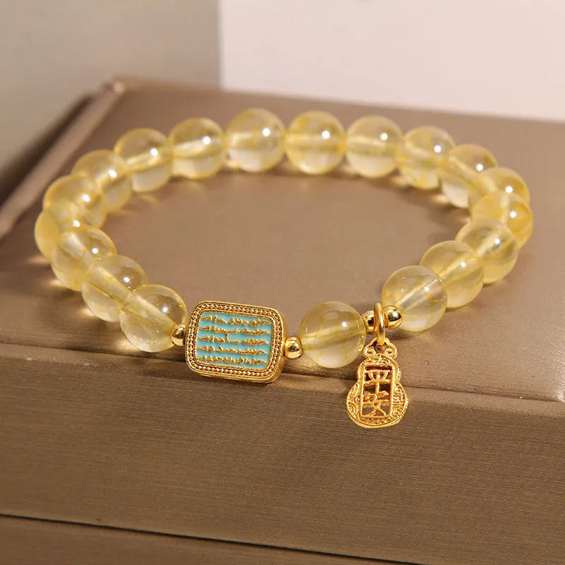 Women's natural yellow crystal bracelet with citrine colour and rhinestone detailing
