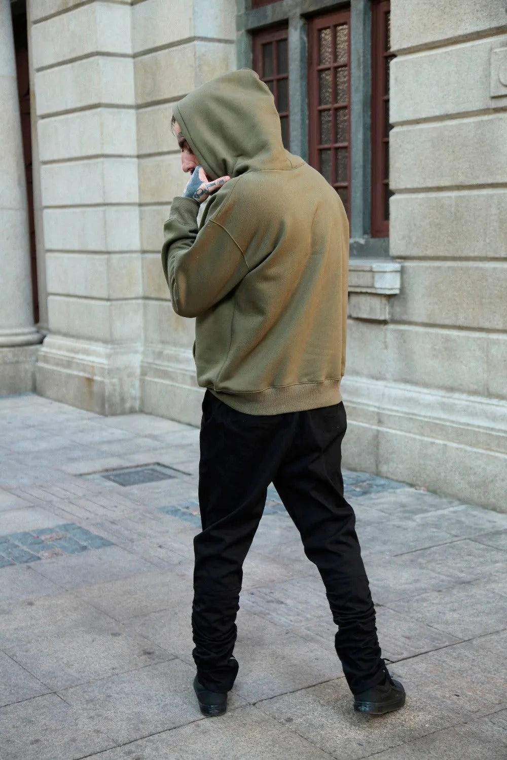 Men's oversize cotton hooded sweater in khaki, front view, hip-hop style with regular sleeves and hood