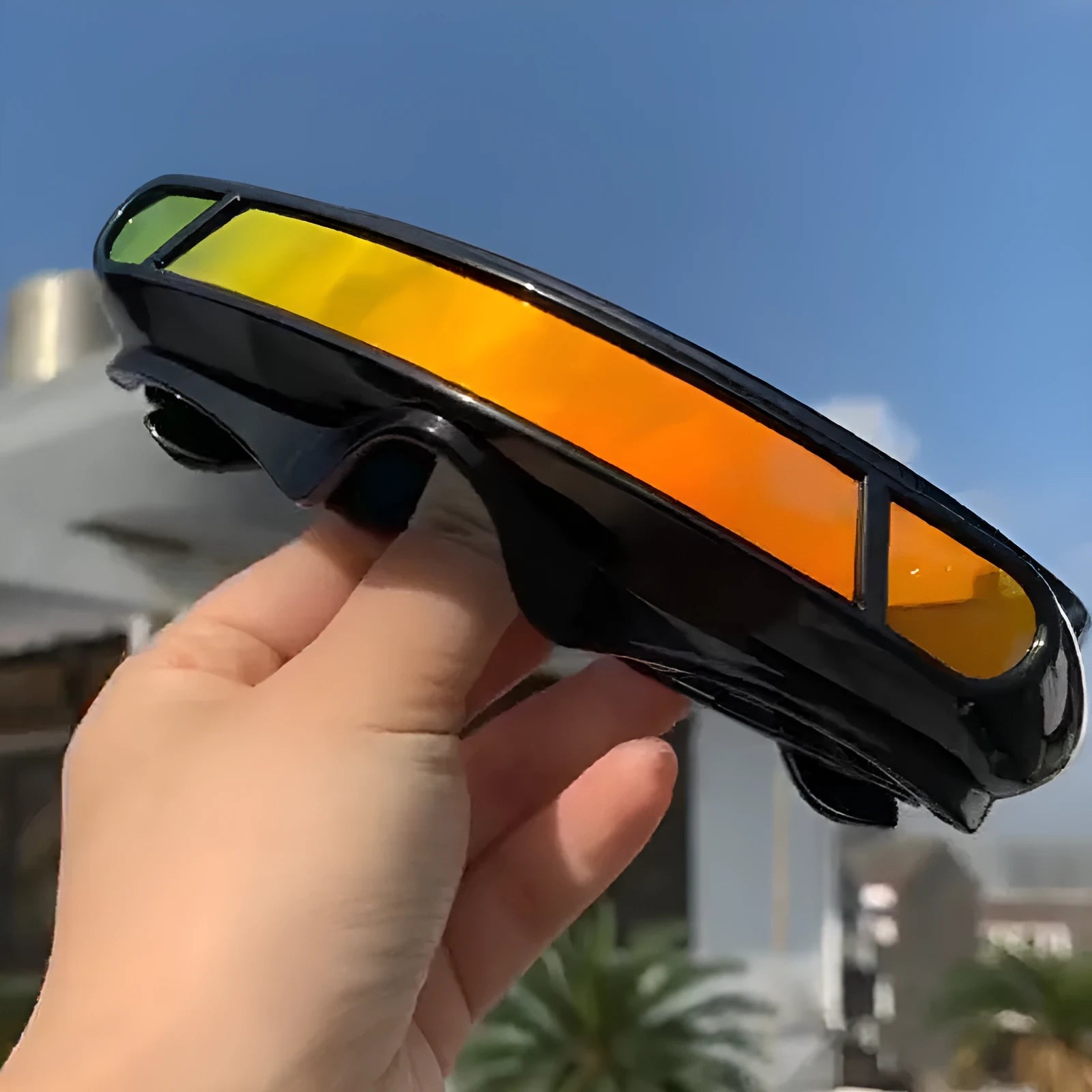 Black sports sunglasses with polarised lenses in grey, red mercury, and blue mercury colour options