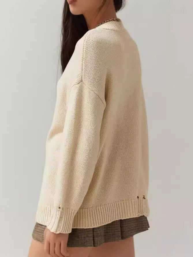 Women's milky white acrylic Jacquard knit pullover sweater with a loose fit and round neck