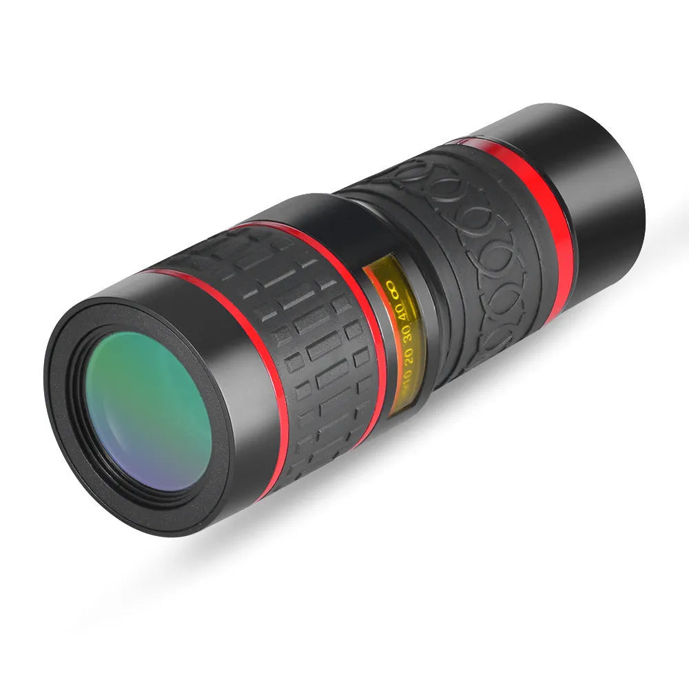 20x magnification smartphone telescope lens with universal mounting clip and single eye mask on a table.