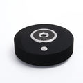 White plastic USB car aromatherapy machine with anti-slip pad on vehicle dashboard