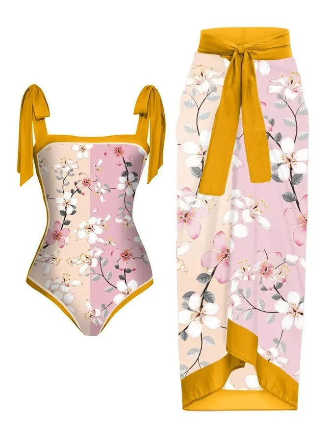 Women's two-piece floral printed swimsuit with matching chiffon-style hip skirt for modest swimming coverage
