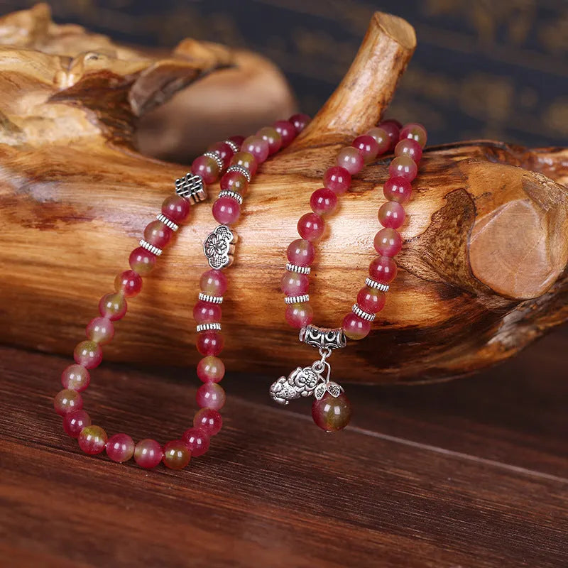 Handmade Chinese knot bracelet with natural watermelon crystal beads in traditional design
