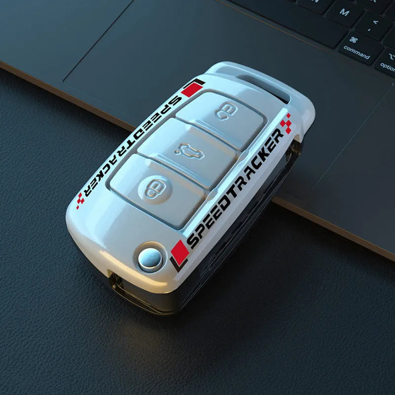 Carbon fibre pattern car key cover in black and white options with minimalist design