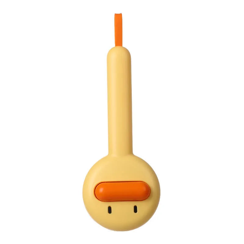 Small yellow duck-shaped pet comb with needle bristles for cat and dog grooming