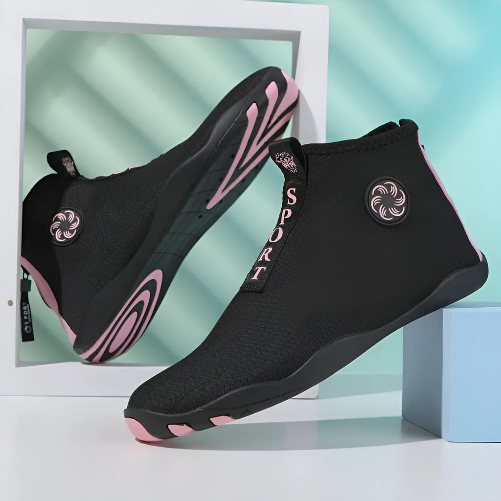 Mid-top beach shoes in black and fluorescent green colour with mesh fabric upper and rubber sole