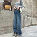 Women's high-waist retro blue straight-leg jeans on a model, showing the classic fit.