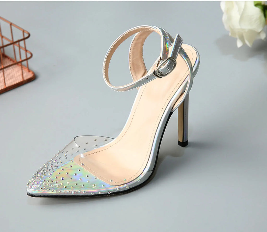 Women's pointed toe diamond sandals with a stiletto heel, showing PVC upper material.