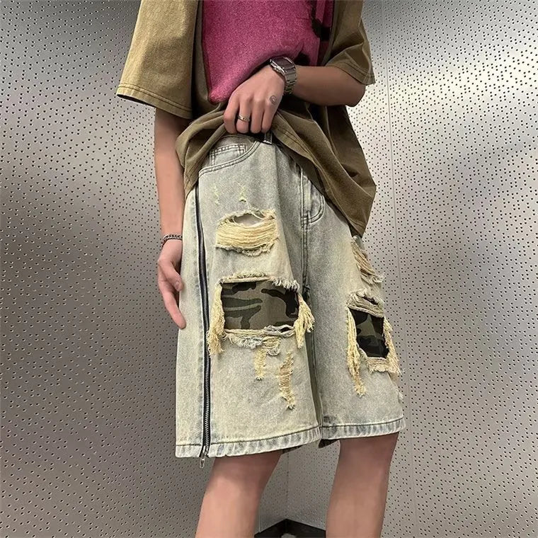 Men's yellow mud camouflage cotton denim cargo shorts with ripped details and straight leg.