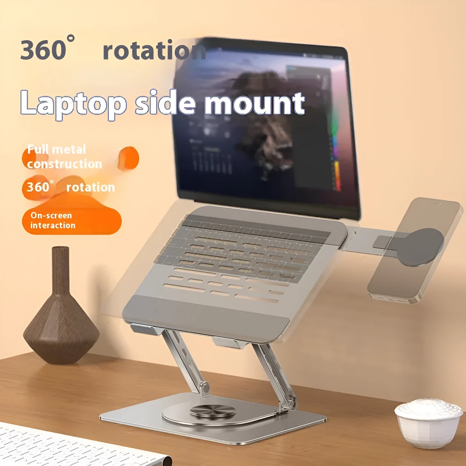 Silver carbon steel laptop stand with a rotatable magnetic phone holder attached to the side.