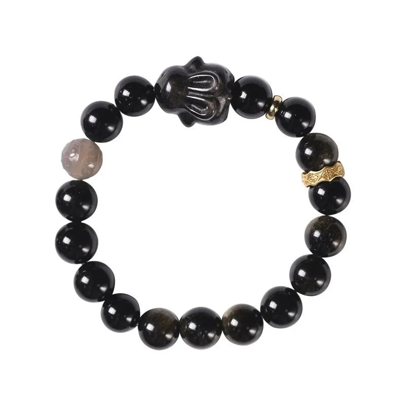 Handmade lying rabbit obsidian bracelet with Jin Yaoshi beads and brass details in national style.