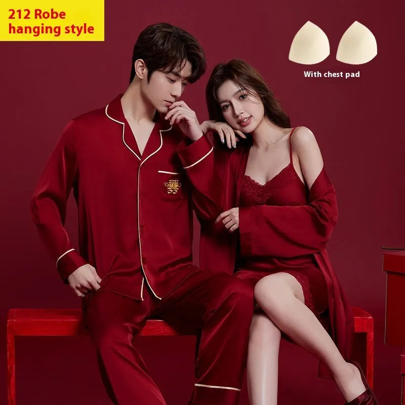 Red long-sleeve ice silk sleepwear set for a man and woman on hangers.