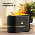 USB simulated flame humidifier with seven-colour lighting on desk next to plant